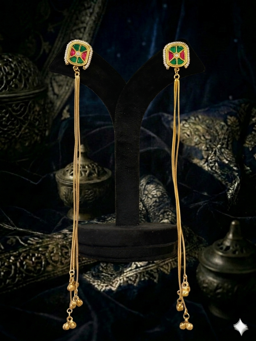 Gold earrings with green and red accents
