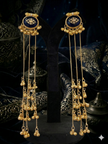 gold earrings with blue center
