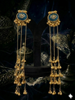 gold earrings with blue gemstones