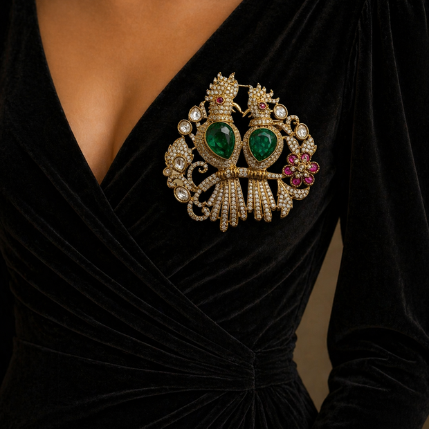 Black velvet dress with a large ornate brooch
