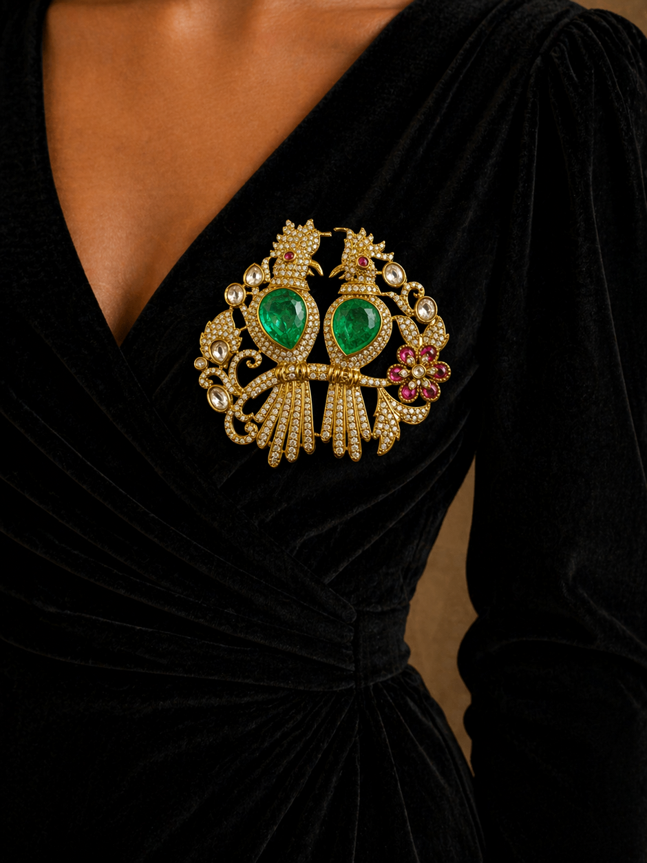 Jeweled brooch with green gemstones