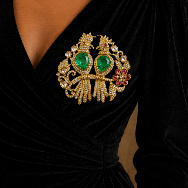 Jeweled brooch with green gemstones