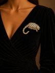 Black dress with a decorative brooch 