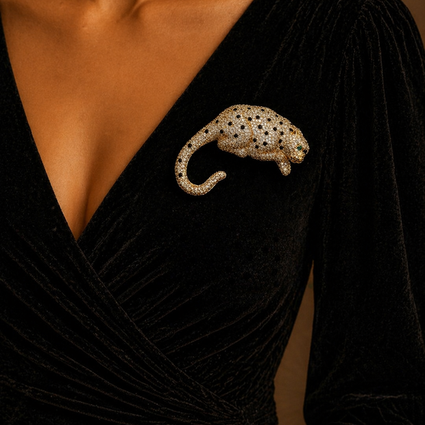 Black dress with a decorative brooch 