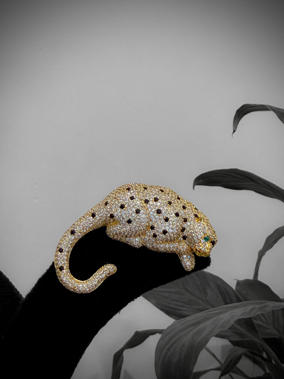 Gold and diamond panther brooch