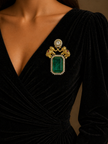 Black dress with a prominent brooch 