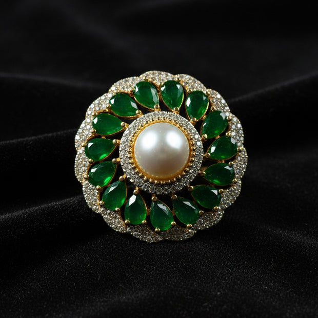 Decorative ring with green gemstones 