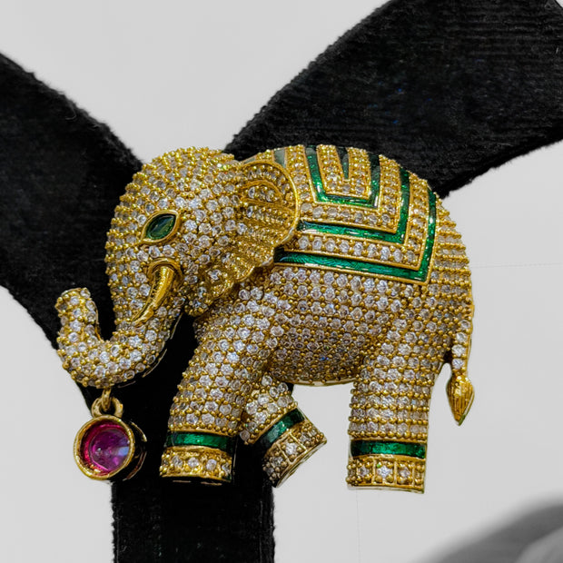 Gold elephant brooch