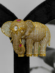 Gold elephant brooch with gemstones 