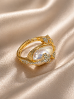 Gold ring with a central gemstone