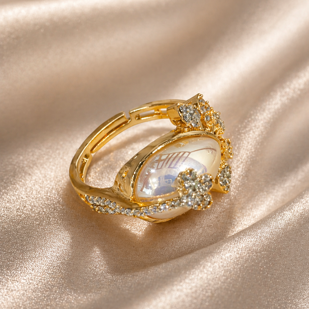 Gold ring with a central gemstone