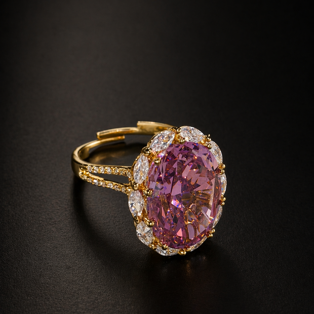 Gold ring with a pink gemstone 
