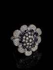 Elegant ring with diamond and sapphire design