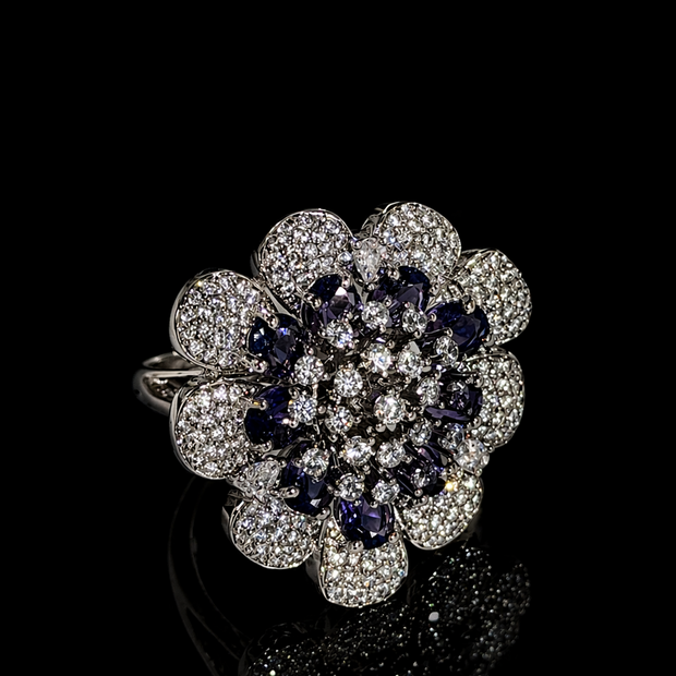 Elegant ring with diamond and sapphire design
