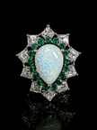 Opal ring with emeralds and diamonds