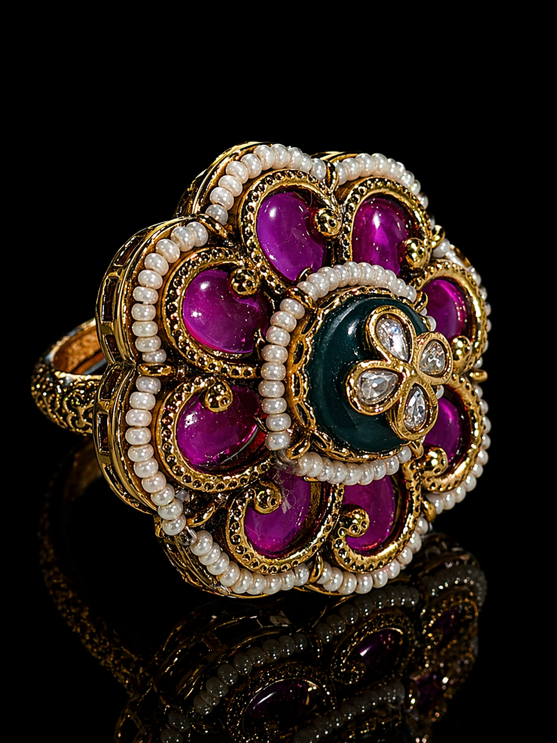 Ornate ring with purple gemstones