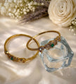 CZ Floral Centre Stone Twisted Rope Bangles