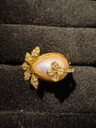 Pearl‑Glow Floral Couture Ring