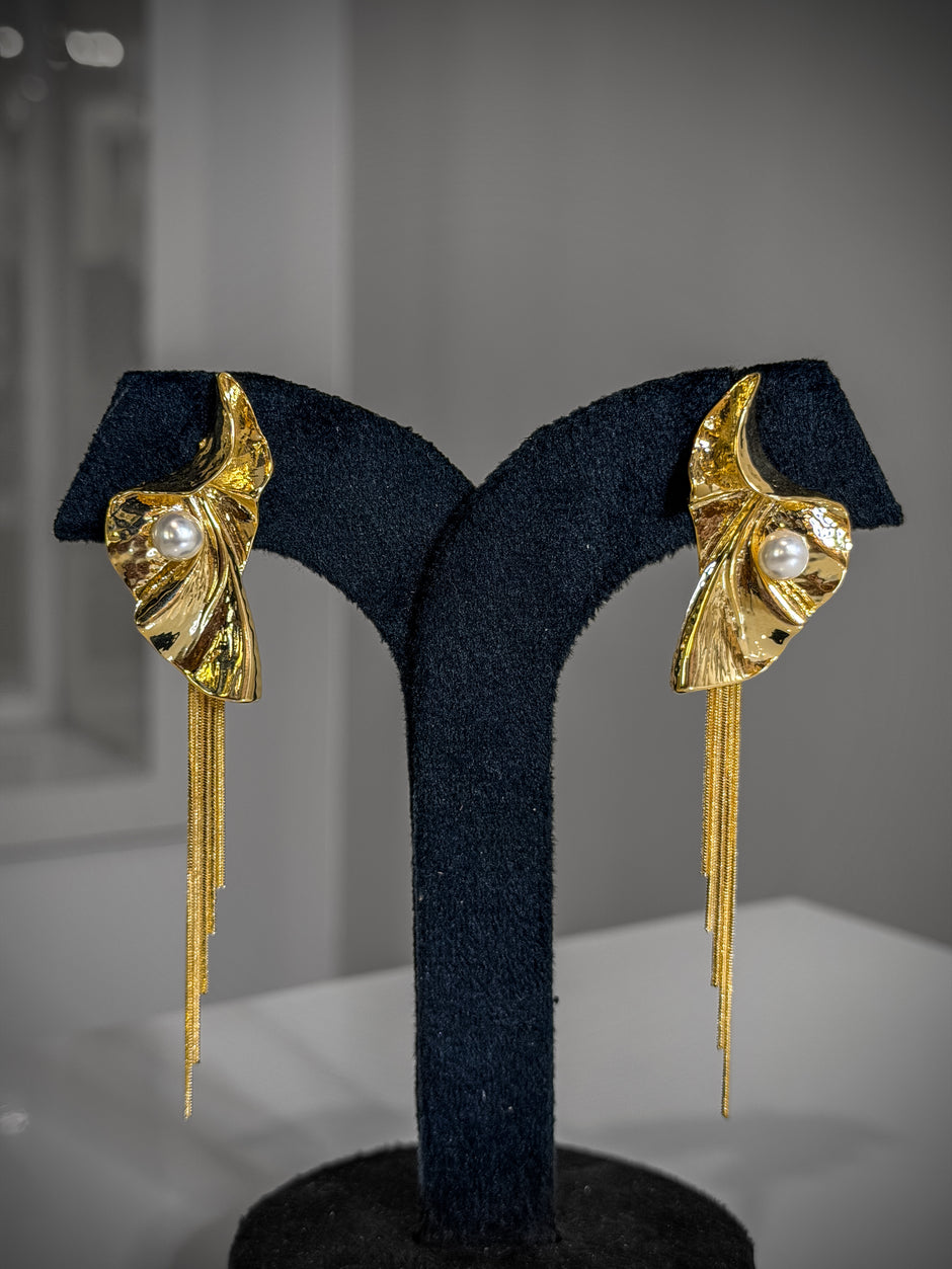 Gold earrings with pearl accents