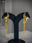 Gold earrings with pearl accents