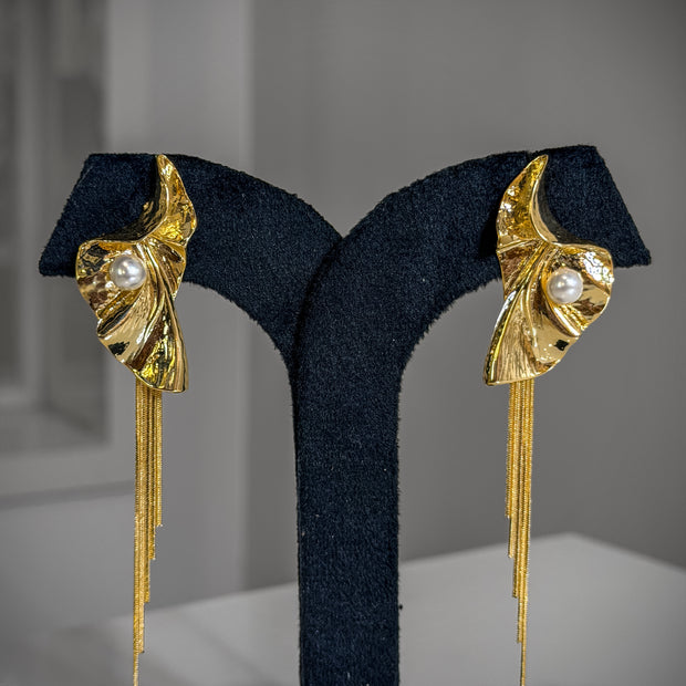 Gold earrings with pearl accents