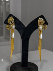 Gold earrings with pearl drops 