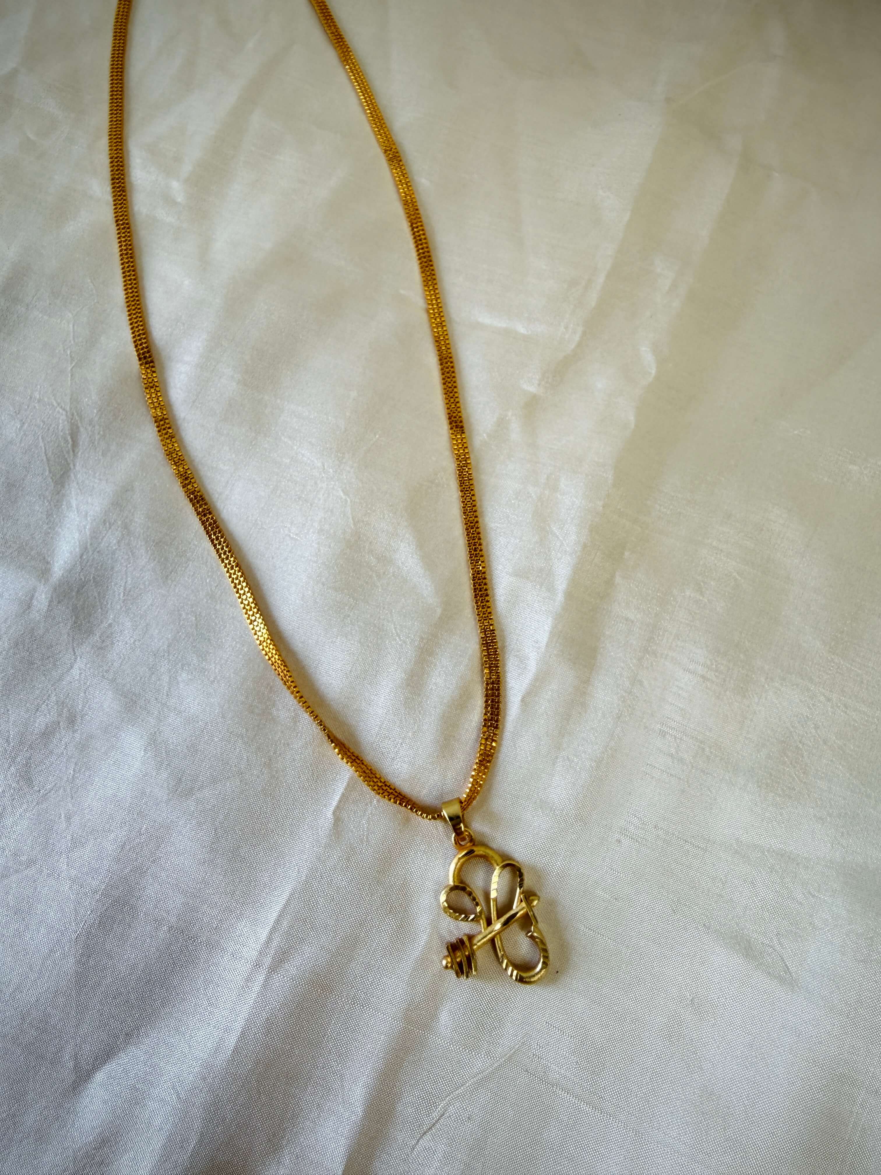 Gold-Plated Ganesh Arrow Head Pendant With Mesh Chain