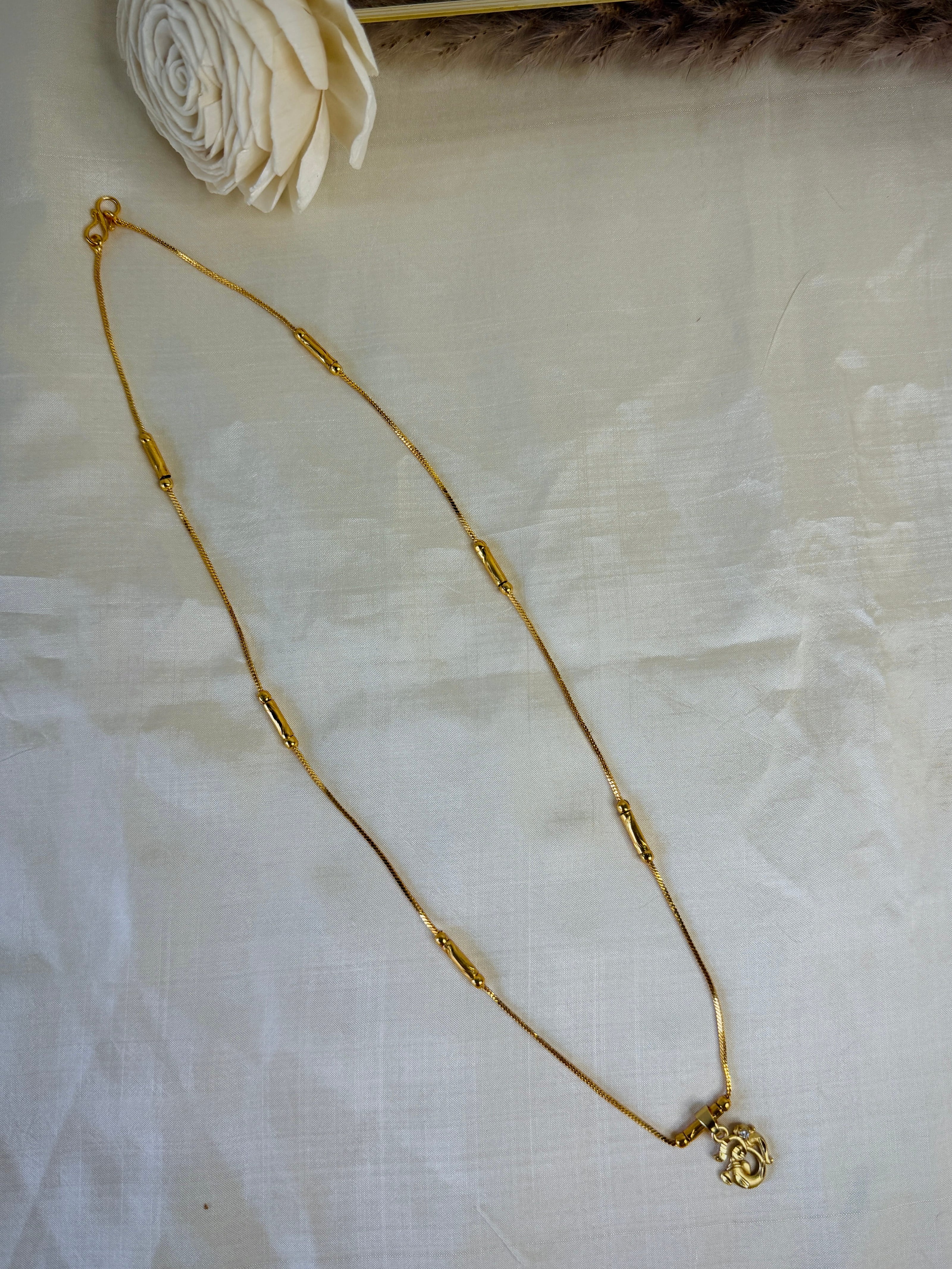 Golden Om ॐ Ganesha Pendant With Tube Station Chain