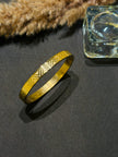 Gold bracelet with geometric pattern 