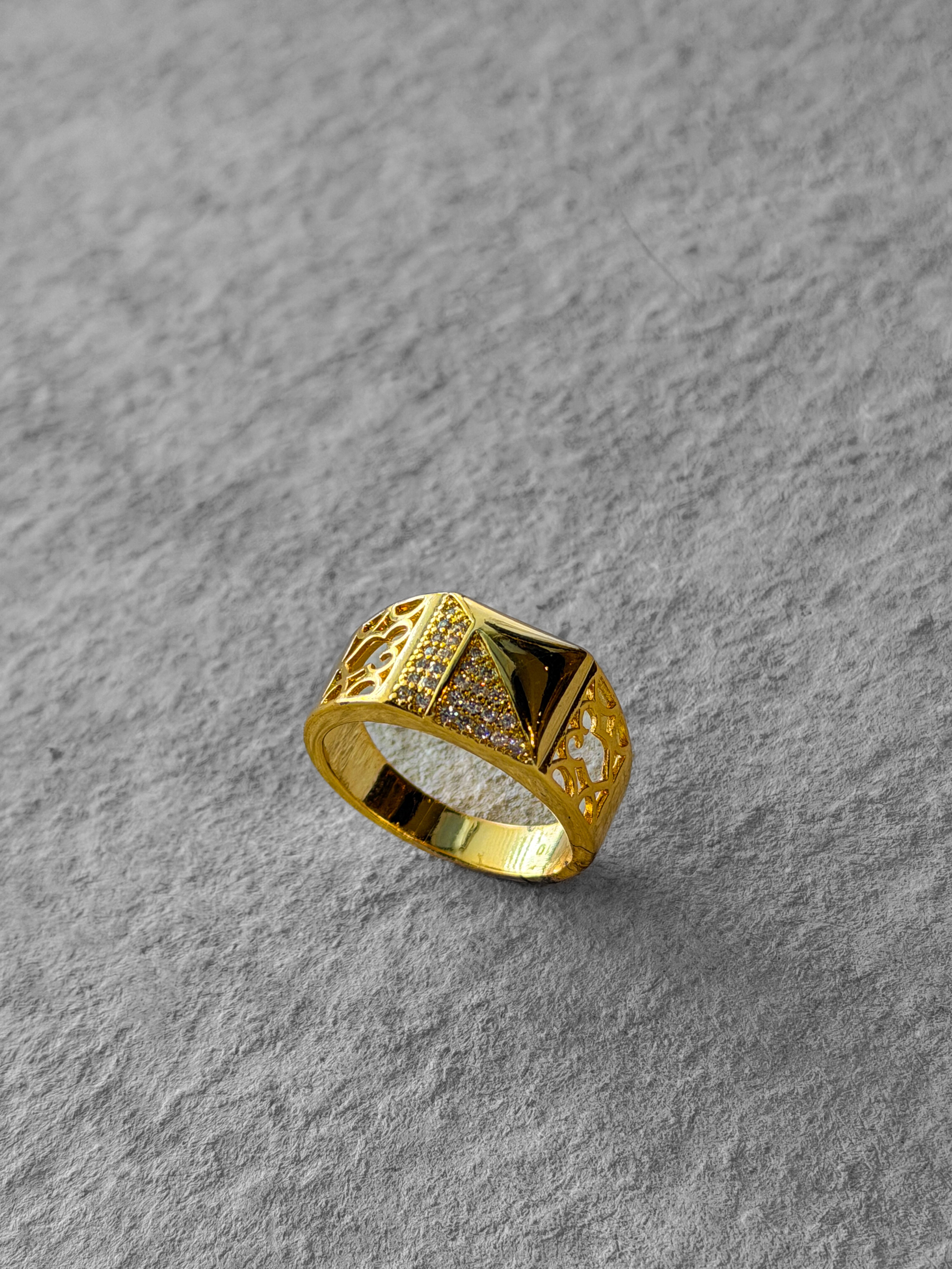 Gold ring with intricate design