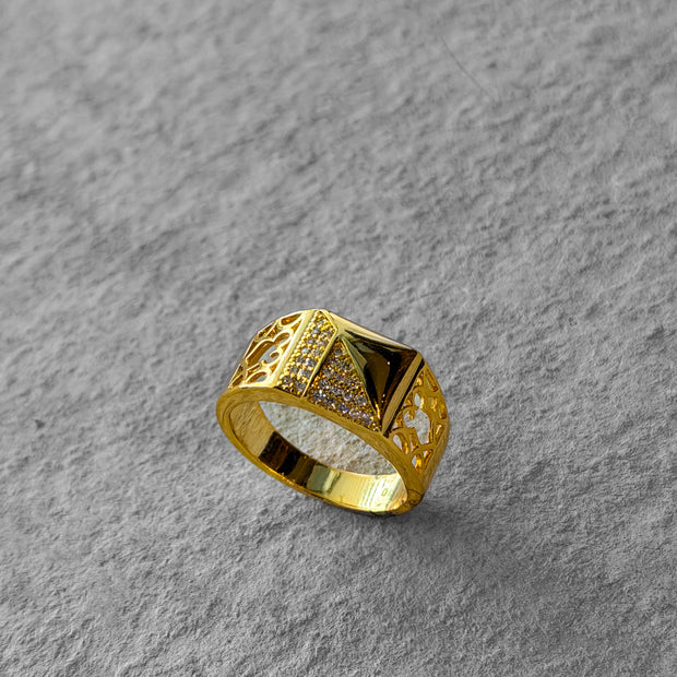Gold ring with intricate design