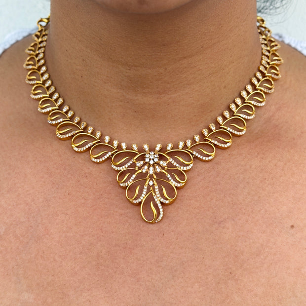 Gold necklace with intricate design