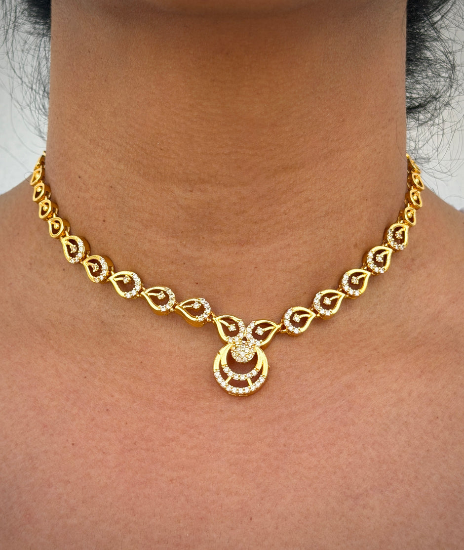 Gold necklace with intricate design 