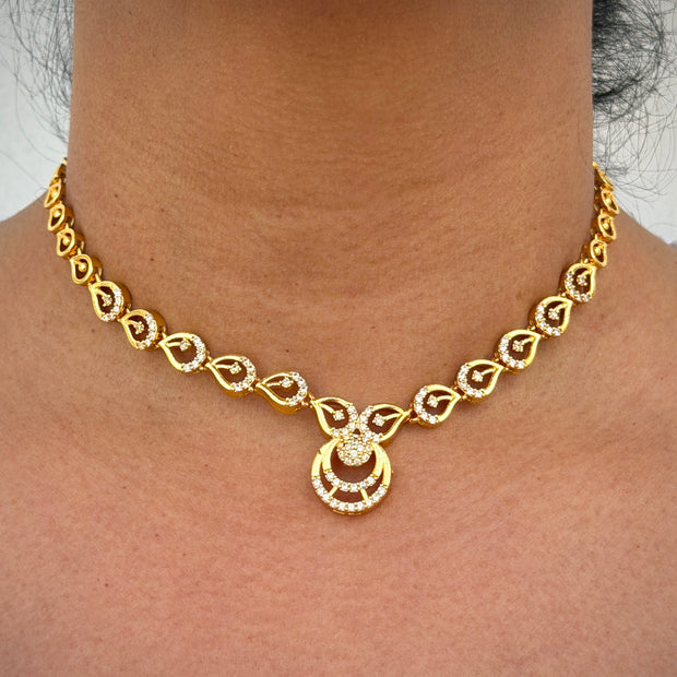 Gold necklace with intricate design 