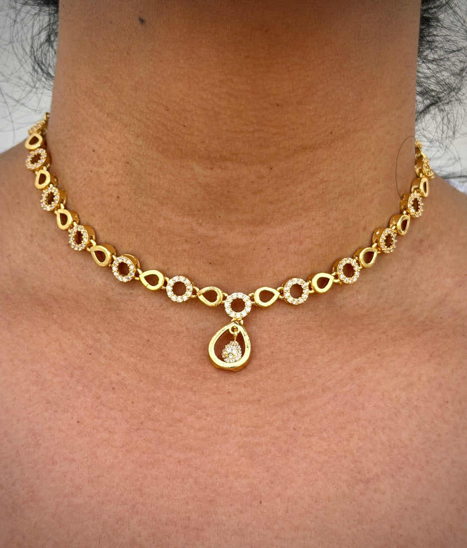 Gold necklace with a pendant 