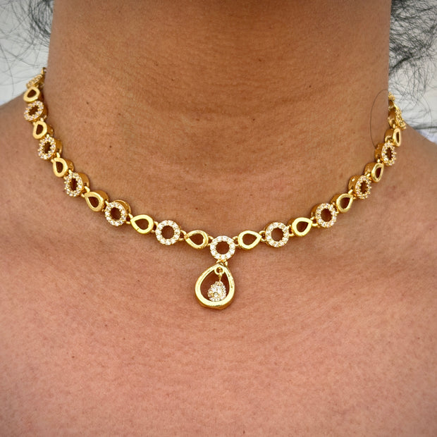 Gold necklace with a pendant 