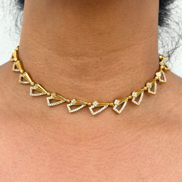 Gold necklace with heart-shaped pendants