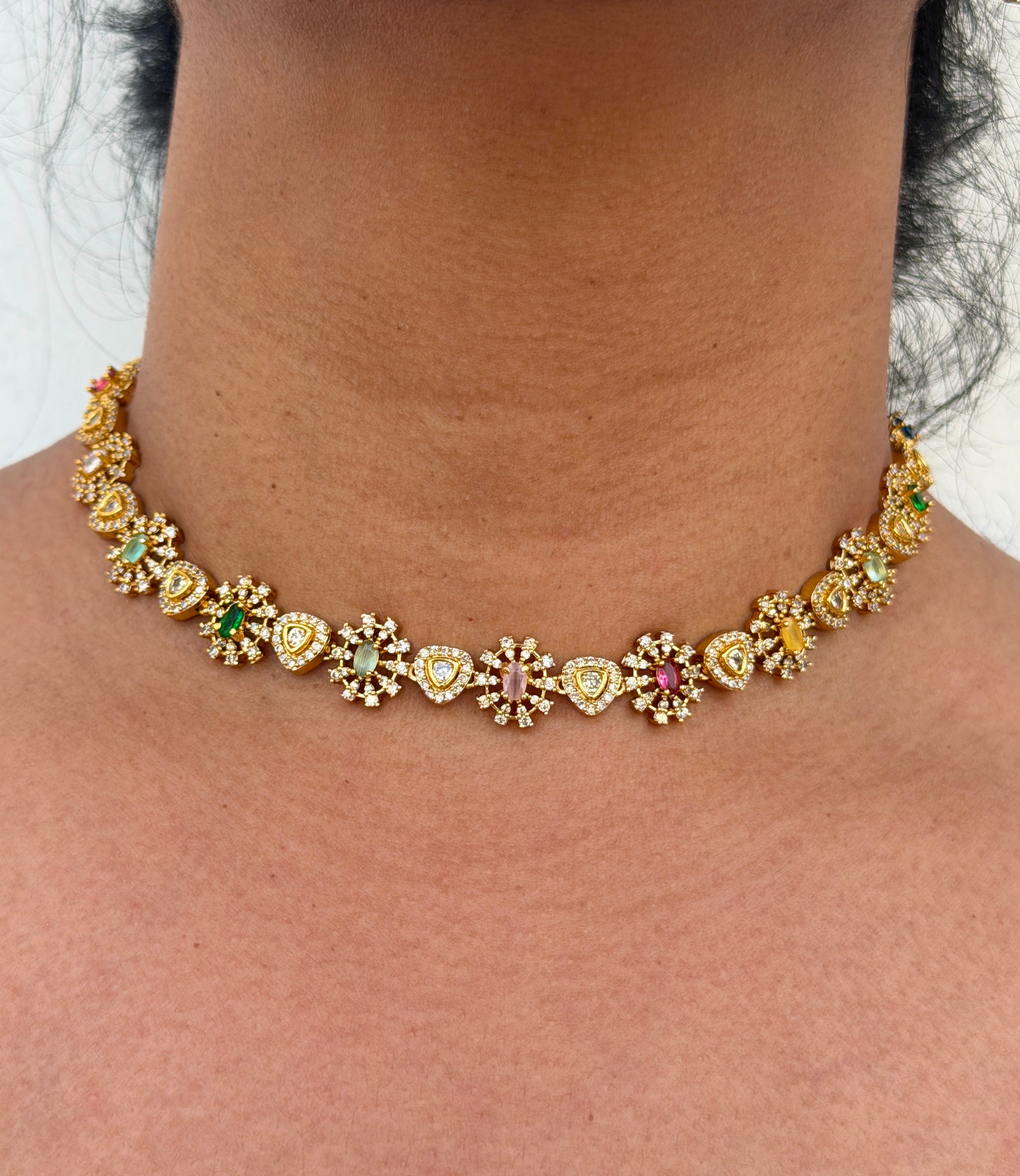 Gold necklace with gemstones 