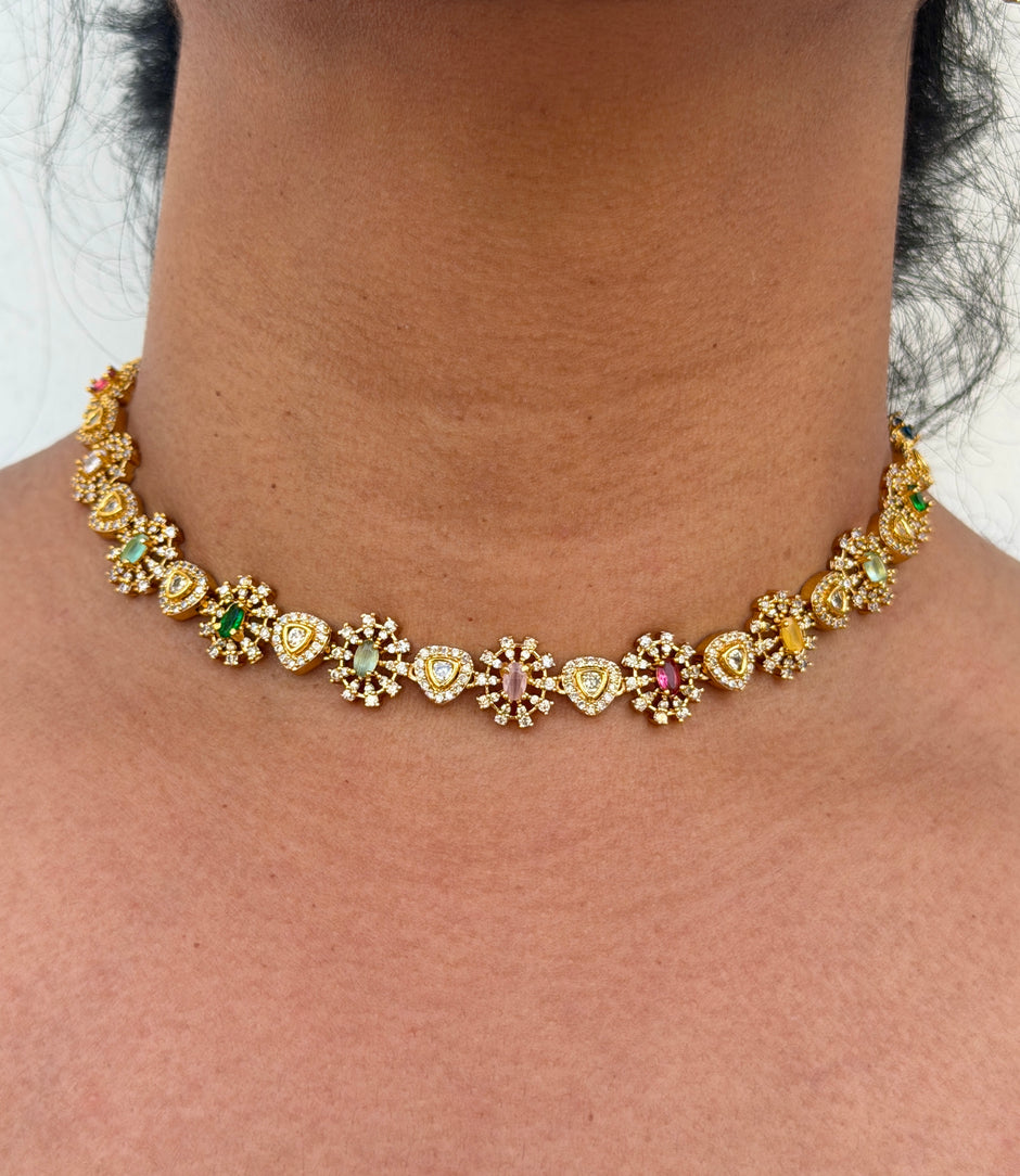 Gold necklace with gemstones 