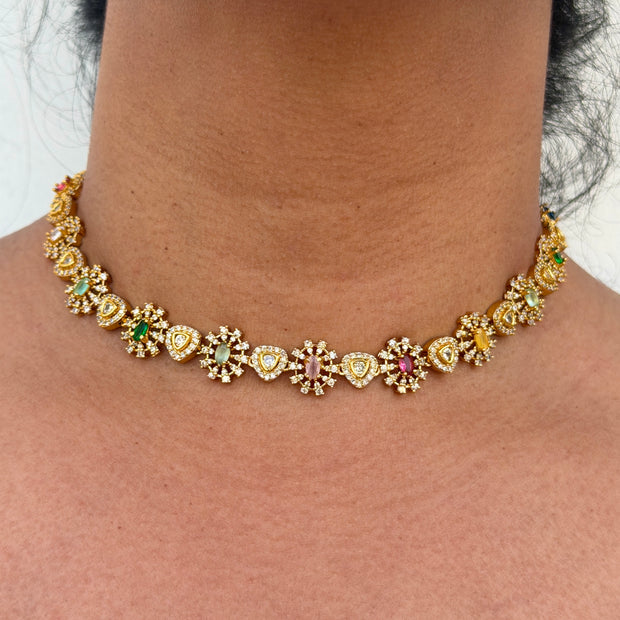Gold necklace with gemstones 