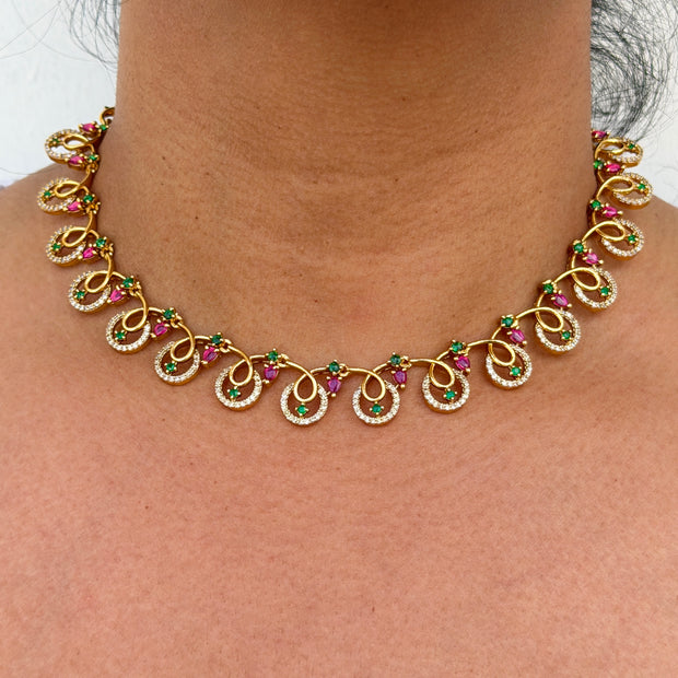 Gold necklace with gemstones 
