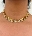 gold neklace with white stone