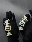 Pair of silver earrings