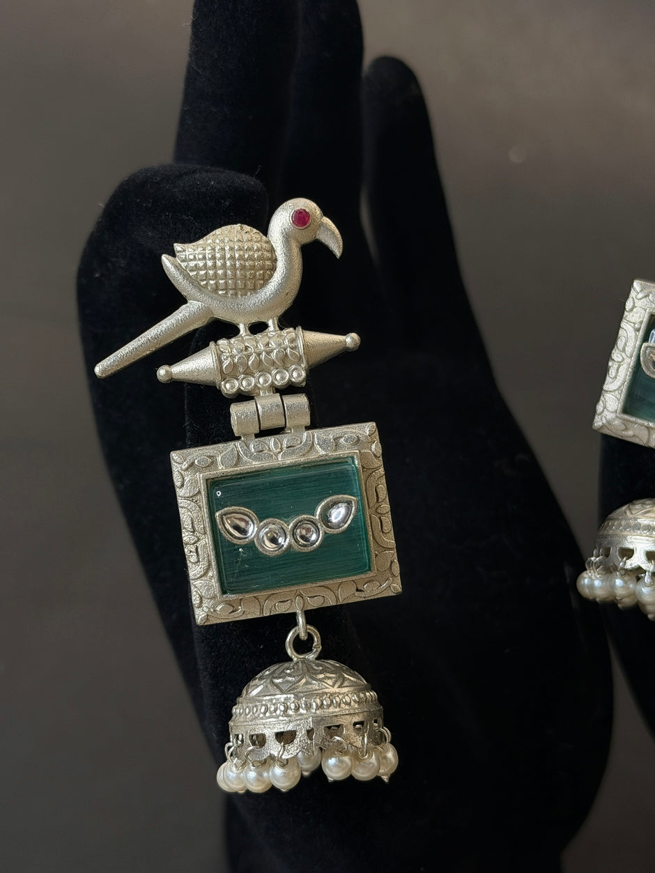 Silver bird-shaped earring