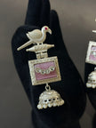 Silver earring with pink gemstone