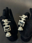Pair of silver earrings with bird design 