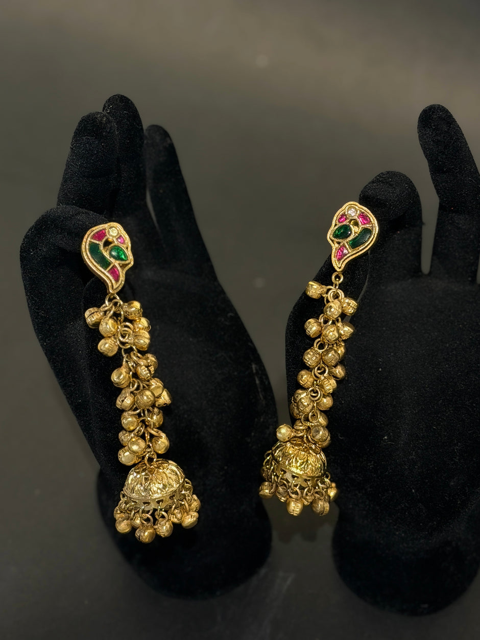 Gold earrings with green and red stones