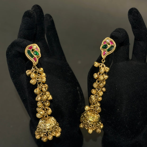 Gold earrings with green and red stones
